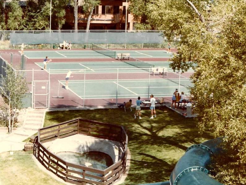 Old tennis courts and heart shaped pool.