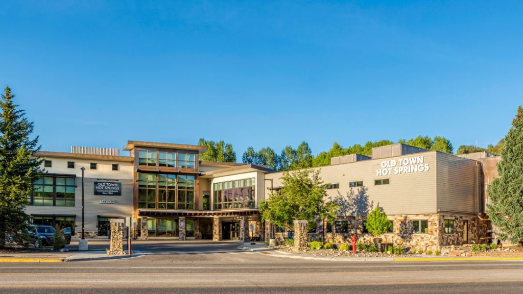 Exterior photo of Old Town Hot Springs on a blue bird day.