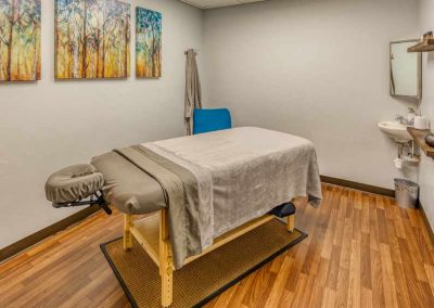 Massage therapy bed inside one of the rooms.