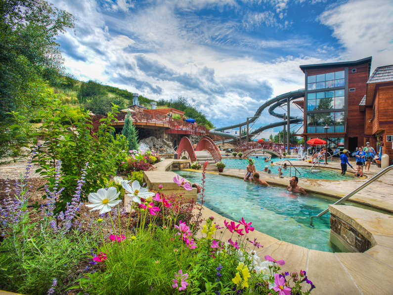 From from 1988 of women coming out to water slide and people enjoying the pools.