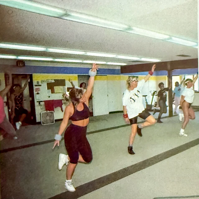 It's time to break out the neon and leg warmers! Join Jean and Karen for our 80s Throwback Aerobics: Halloween Edition class tomorrow at 9 am. This high-energy aerobics class is packed with retro moves, throwback beats, and some Halloween fun. Costumes encouraged, good vibes, and a great workout guaranteed!

Also... Who remembers when the gym looked like this? 😆 We've come a long way!